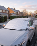 Magnetic Windscreen Frost Cover fitted on a frosty car at sunrise