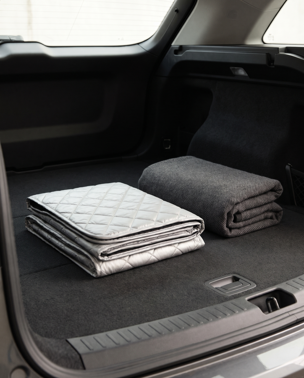Frost cover folded flat for storage in a car boot