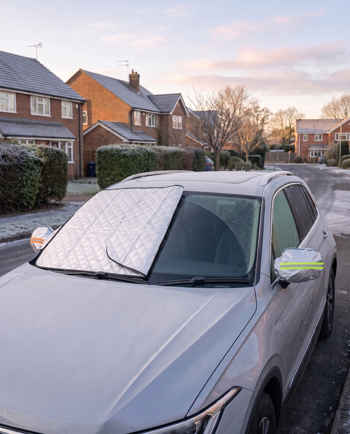Frost cover folded back to reveal a clear, frost-free windscreen